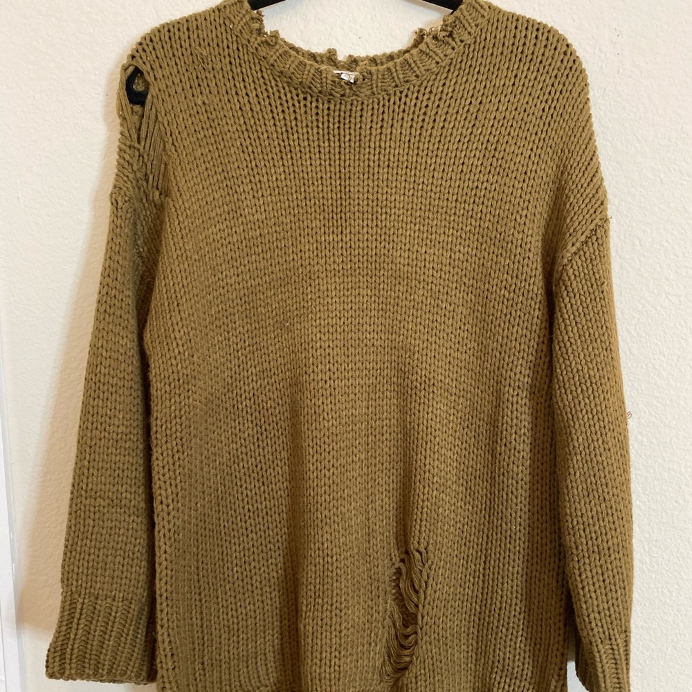 Cute distressed sweater